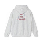 Ski Sip Repeat Hooded Sweatshirt